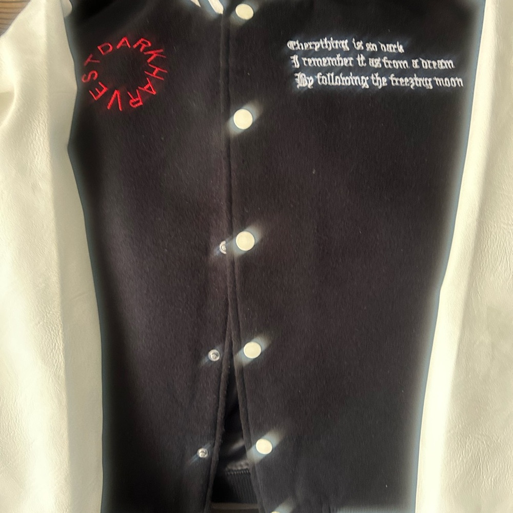 Black & White Colorblock Snap-Front Jacket with Red Script Accent